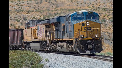 K Chasing A Csx Union Pacific Rail Train In Southern California