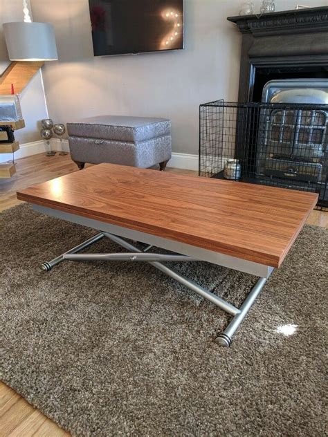 They are cocktail tables which convert, transform, or change to a particular form. Dwell Coffee Table • Display Cabinet