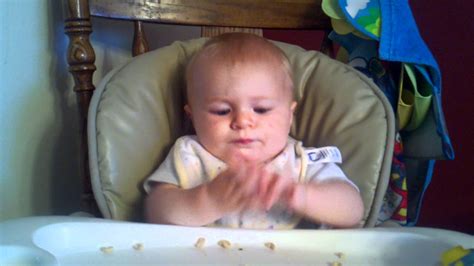 The Baby Eating Cheerios For The First Time Youtube