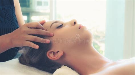 Woman Gets Facial And Head Massage In Luxury Spa Stock Image Image Of Natural Female 199535767
