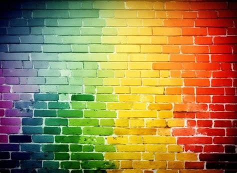 Premium Photo A Rainbow Colored Brick Wall Is Painted In Rainbow Colors