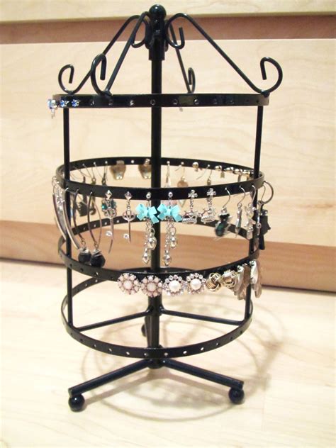 25% off 72 holes 10 hooks wall hanging earring jewelry display stand storage rack metal hanging shelf with hooks space save jewelry organizer holder 0 review. MMnoob: Rotating earring holder from Ebay