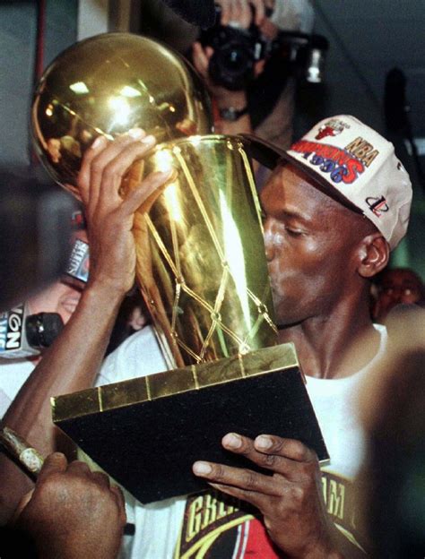 Michael Jordan Having An Intimate Moment With The Nba Championship