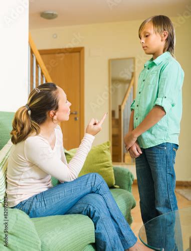 Mother Scolding Teenage Son Buy This Stock Photo And Explore Similar