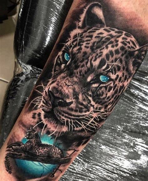 our artist cebaz is performing next level tattoos those eyes tattoo leopard tattoos