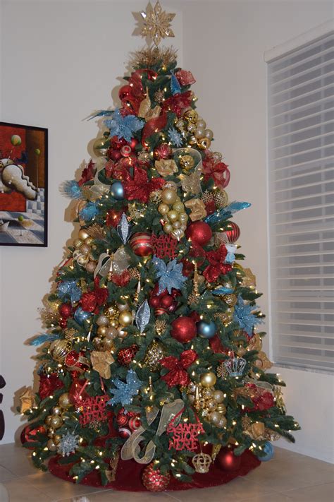 Red gold and silver christmas tree. Beautiful Christmas Tree decorated in Gold, Red and light Blue … | Blue christmas tree ...