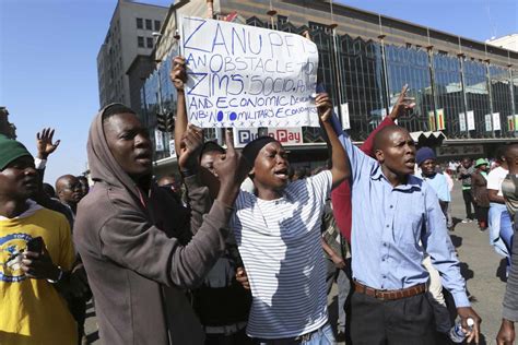 violence escalates in zimbabwe as court rules against anti government protests cnn