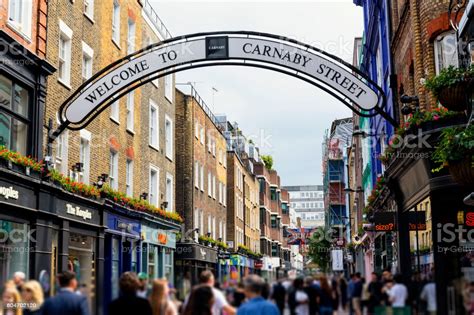 Find the reviews and ratings to know better. Shops And Restaurants In Carnaby Street London Stock Photo ...