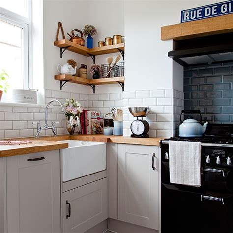 For this reason, it is important that you pl. White kitchen corner with metro tiles and wooden worktop ...