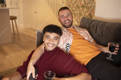 Happy Gay Male Couple Drinking Wine On Sofa At Home Stock Image F0340687 Science Photo
