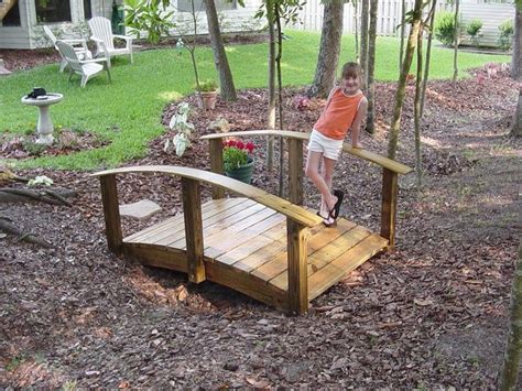 In order to get to my back bee yard, i've got to cross a creek. Building a temporary foot bridge over a small creek ...
