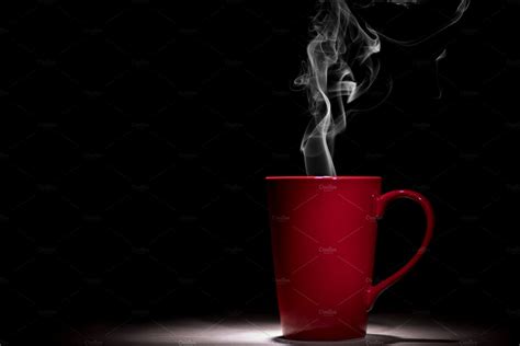 Red Coffee Cup With Smoke On Black B High Quality Stock Photos