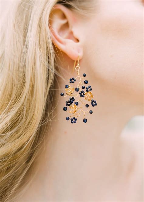 The blossom chandelier is a romantic chandelier inspired by nature. Midnight Chandelier Earrings Swarovski crystal and bead ...
