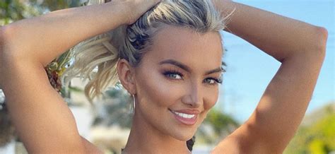 lindsey pelas in unzipped swimsuit celebrates her nice chest