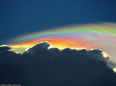 Photographer Captures Rare Fire Rainbow Cloud Above Florida As Mother