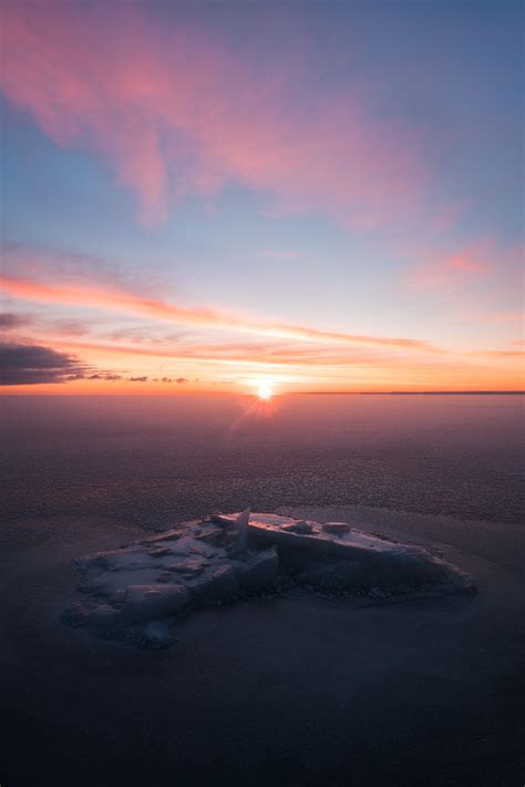 Colorful Sunrise Lighting Up A Freshly Frozen Lake Superior Duluth Mn