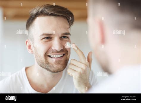 Male Facial Care Stock Photo Alamy