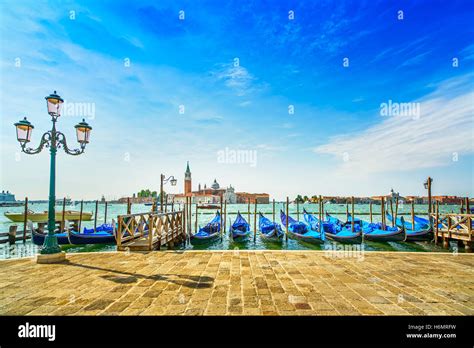 Venice Street Lamp And Gondolas Or Gondole Blue Sky Twilight And San