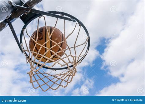 Basketball Ball Enters The Basket In A Swish Shoot Stock Image Image