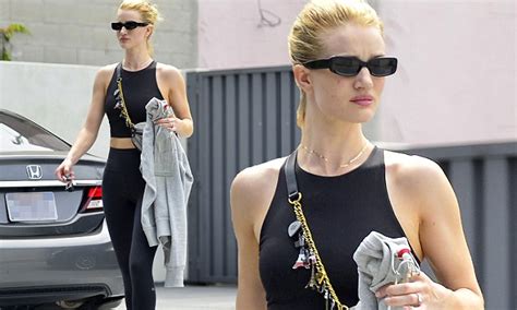 Rosie Huntington Whiteley Flashes Her Abs As She Shows Off Slender Post