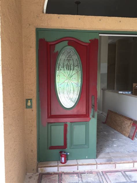 You don't need to take it off the hinges, remove the hardware, or anything! Painting the Front Door - Again - Pinterest Addict