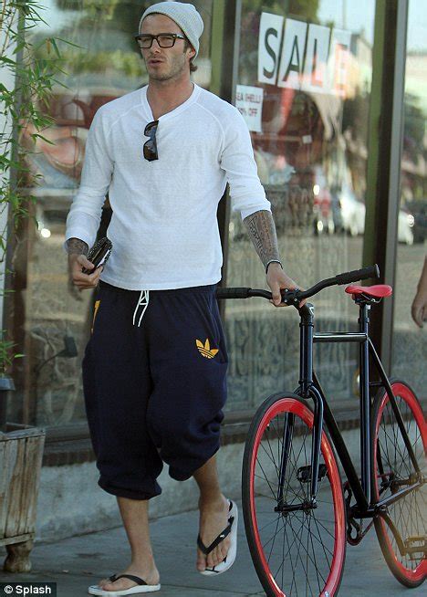 David Beckham Tries Geek Chic While Bicycle Shopping With Romeo Cruz