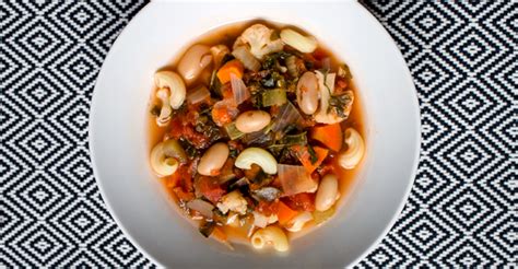 White bean soup may be served with cooked sausages and bread. Kale and White Bean Soup - Plant-Based Diet Recipes - Soup