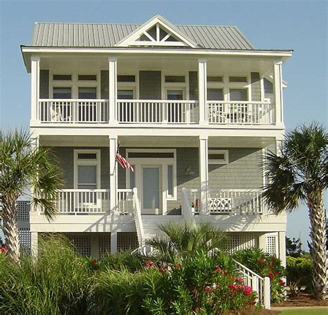 Beach house plans coastal home plan shop. The Porches Cottage is characterized by an inverted living ...