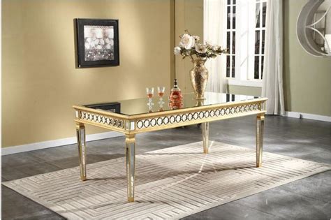 If you're styling is more contemporary, any of the modern mirrored dining tables available will add to the chic look. Modern Stylish 38" Width Mirrored Dining Table in Gold ...