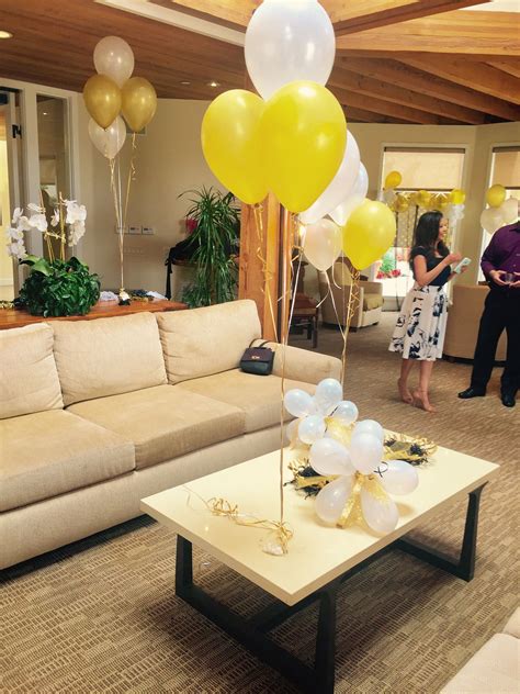 Maybe you would like to learn more about one of these? Gold and ivory graduation party.... balloons galore ...