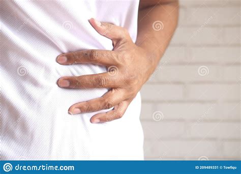 Young Man Suffering Stomach Pain Close Up Stock Image Image Of Pain