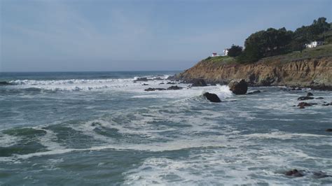 5k Stock Footage Aerial Video Fly Over Breakwater By Coastal Cliff