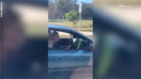 Woman Caught On Camera Using Both Hands On Phone Instead Of Wheel The