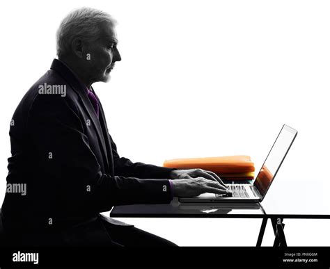 One Caucasian Senior Business Man Serious Computing Laptop Silhouette