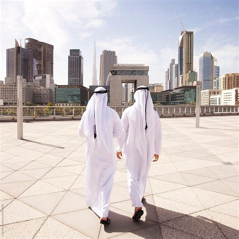Traditional Dressed Arab Businessmen Dubai Uae By Hugh Sitton