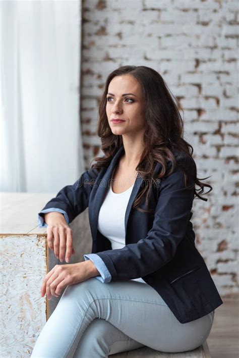 Portrait Of Pensive Business Woman Brunette In Casual Suit Sitting Stock Image Image Of Office