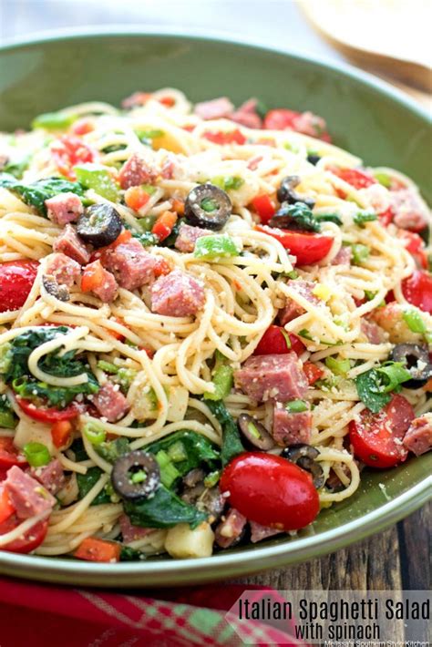 Combine cooked pasta with italian dressing, italian salad seasoning, green onions, cucumber, tomatoes and black olives. Italian Spaghetti Salad with Spinach ...