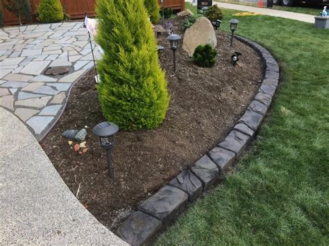This would include stonework that is not laid in the ground, as well as landscape timbers, railroad ties, concrete blocks or landscaping bricks which are used to define. Decorative Concrete Lawn Edging - Brilliant Borders