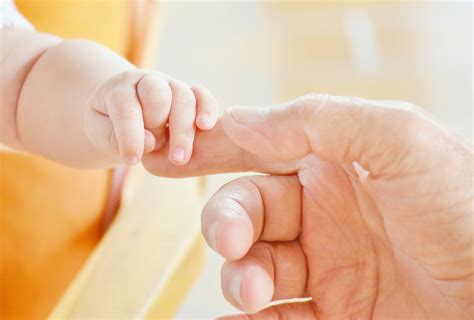 Babys Hand Holding Adult Hand Photo Hd Wallpaper Wallpaper Flare