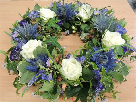 Scottish Style Design With Beautiful Blue Alpine Thistles Cream Roses