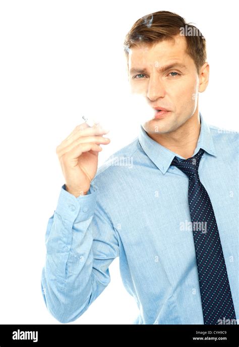 Young Businessman Smoking Cigarette On A White Background Stock Photo