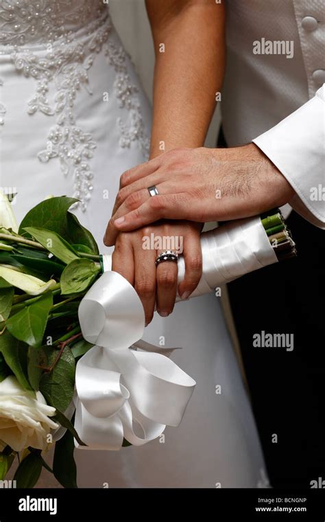 Wedding Couple Showing Wedding Rings Stock Photo Alamy