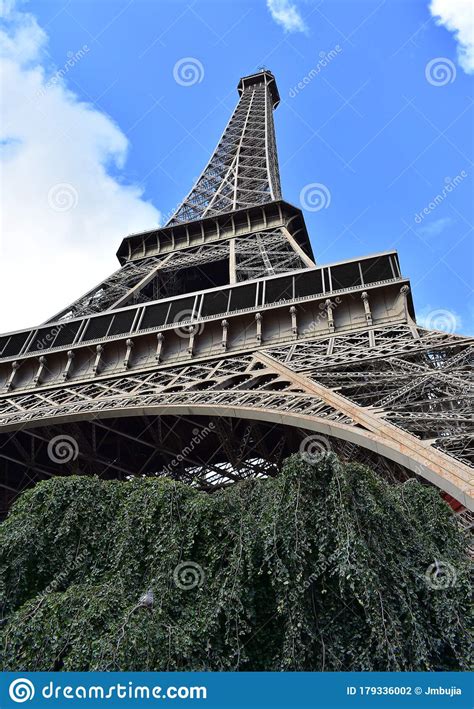 Tour Eiffel Or Eiffel Tower Perspective From Below From Champ De Mars