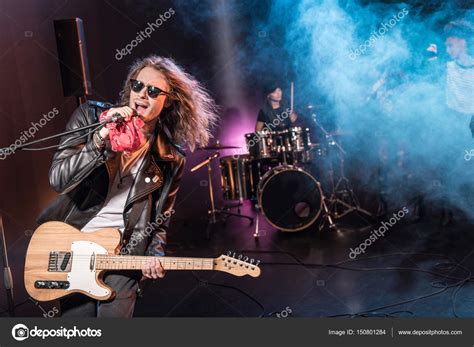 Rock Band On Stage — Stock Photo © Tarasmalyarevich 150801284