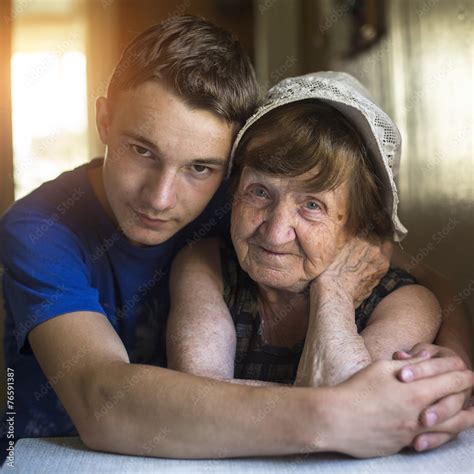 Grandmother And Grandson Portrait Together In An Embrace Stock Foto