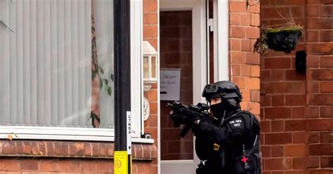 coventry siege ends as armed police force their way into property birmingham live