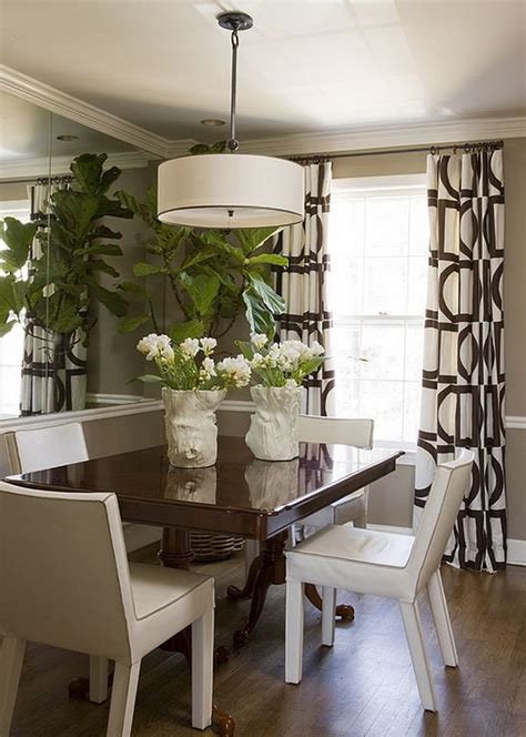Lovely Drapes And A Large Pendant Add Style To The Small Space Dining