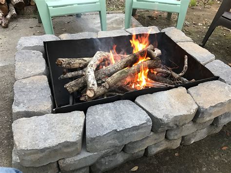 Inexpensive Fire Pit made from a 55 Gallon Drum, a grate ...