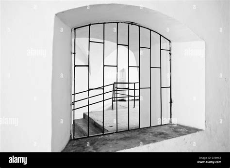Arched Window With Metal Grating Black And White Stock Photo Alamy