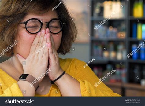 Fat Asian Women Rubs Her Nose Stock Photo Shutterstock